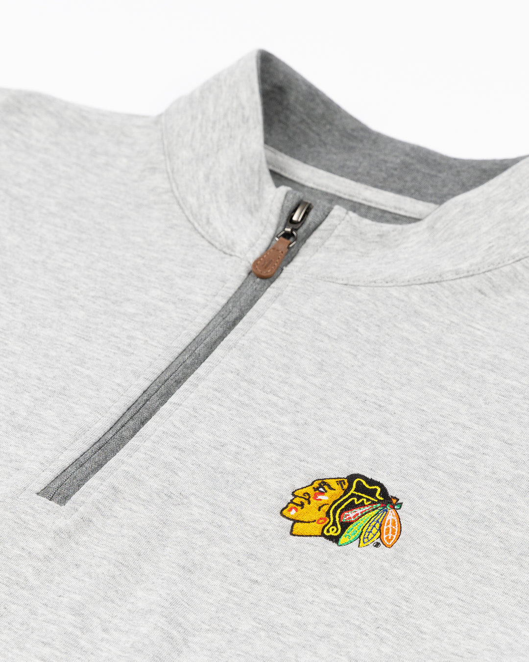 grey johnnie-o quarter zip with Chicago Blackhawks primary logo embroidered on left chest - front detail lay flat
