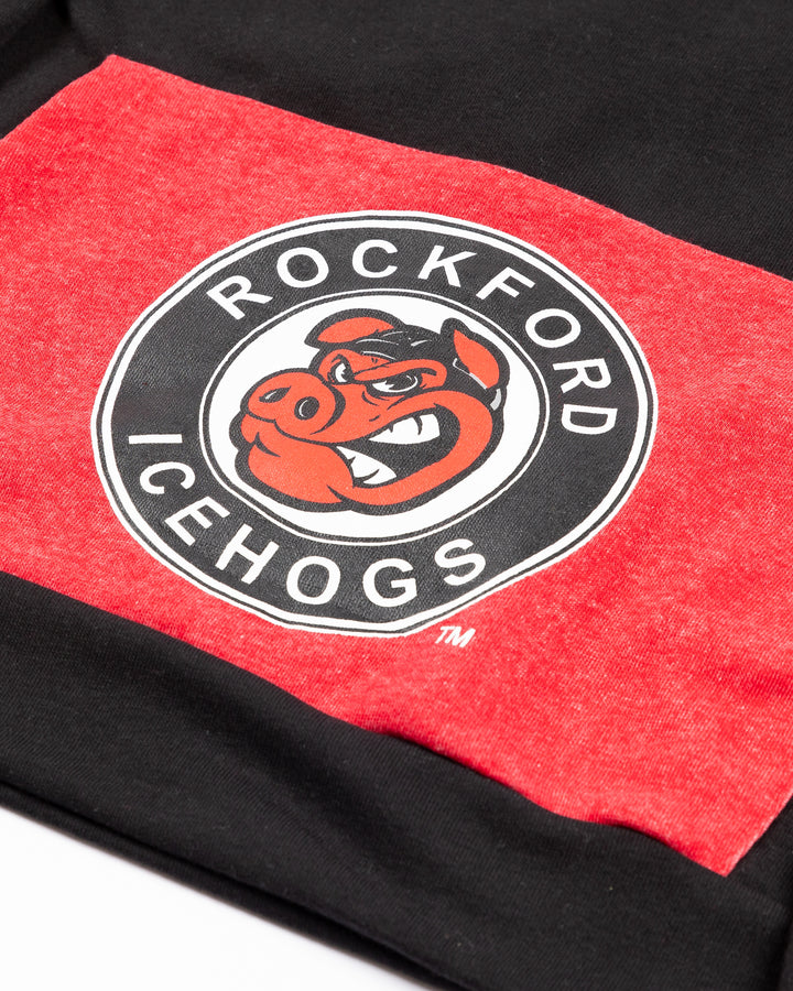 black Rockford IceHogs hoodie with primary logo on red kangaroo pouch and IceHogs wordmark on left sleeve and all over primary logo print on inside of hood - kangaroo pocket detail lay flat