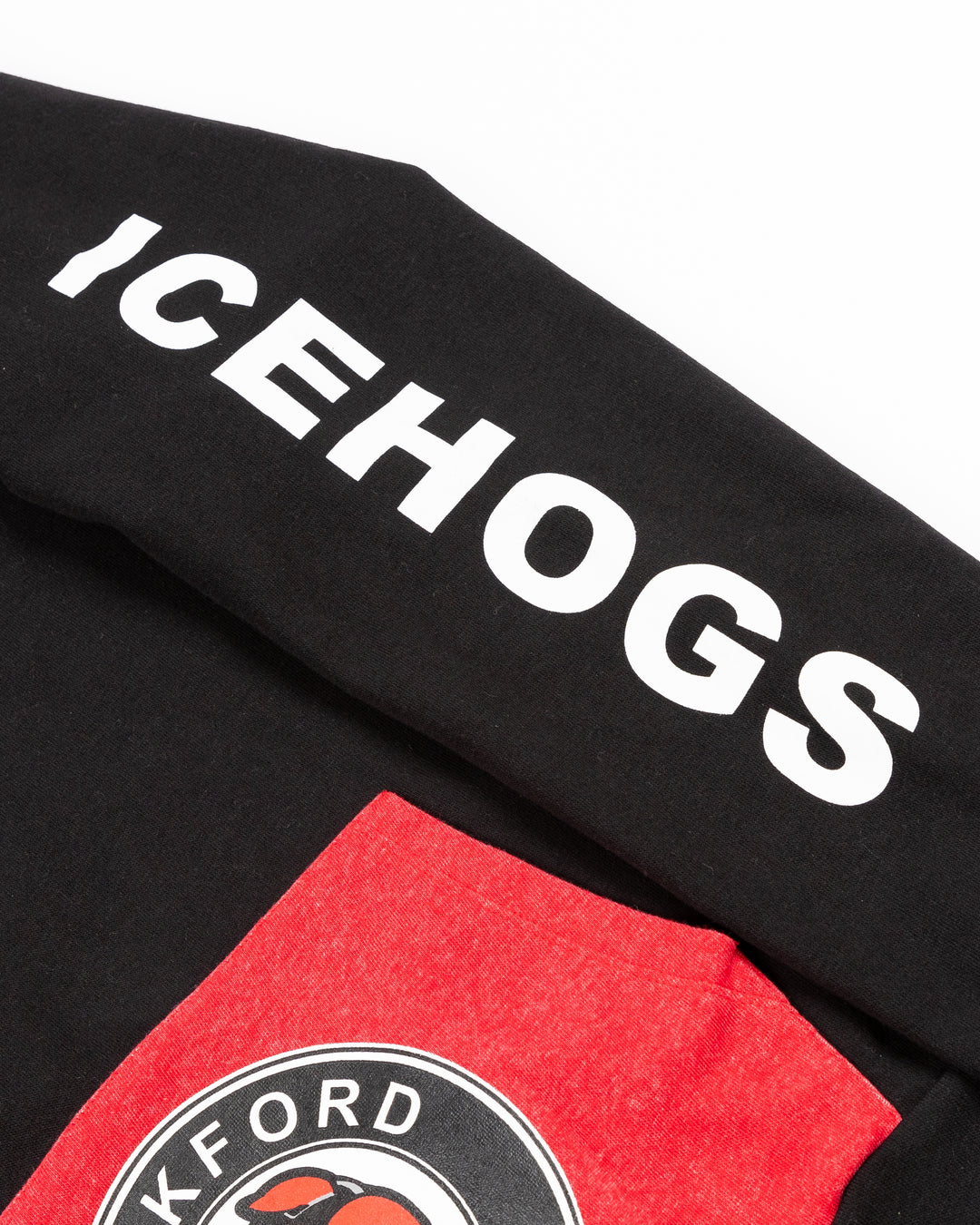 black Rockford IceHogs hoodie with primary logo on red kangaroo pouch and IceHogs wordmark on left sleeve and all over primary logo print on inside of hood - left sleeve detail lay flat