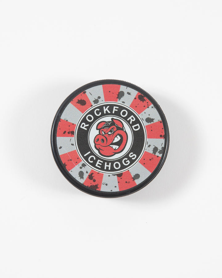 Red and grey distressed Rockford IceHogs hockey puck - front lay flat