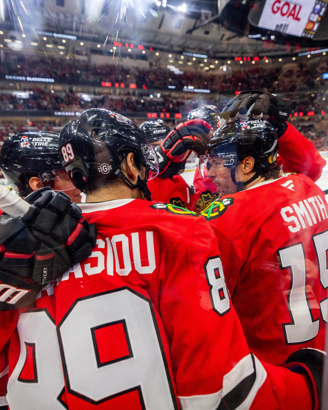 Chicago Blackhawks celebrating after Craig Smith scored in game on October 19, 2024