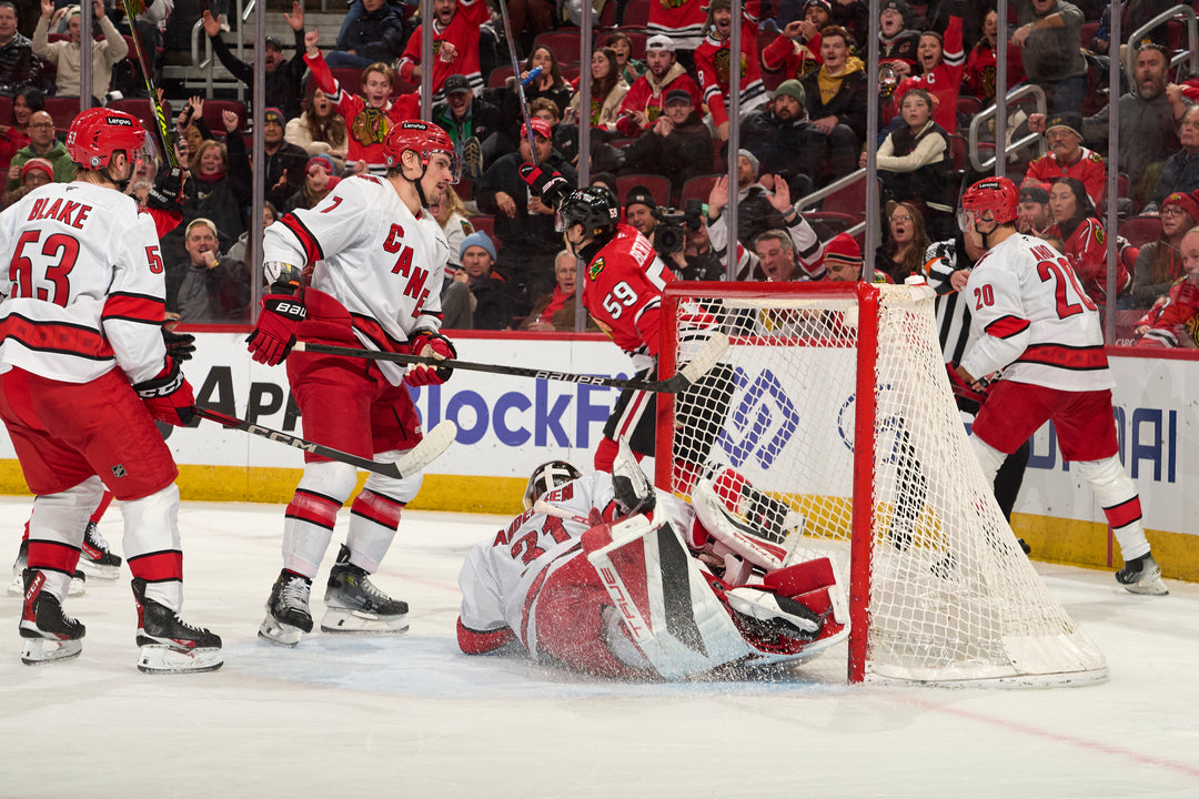 Chicago Blackhawks player Tyler Bertuzzi scoring goal against Carolina Hurricanes on January 20, 2025