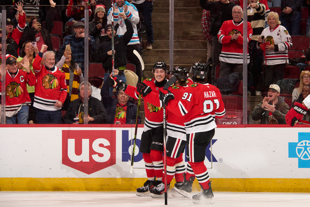 Chicago Blackhawks players Bertuzzi, Bedard and Nazar celebrating goal scored by Bertuzzi against the Carolina Hurricanes on January 20, 2025