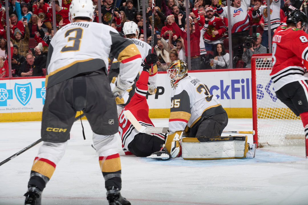 Chicago Blackhawks player Tyler Bertuzzi scoring against Vegas Golden Knights on January 18, 2025