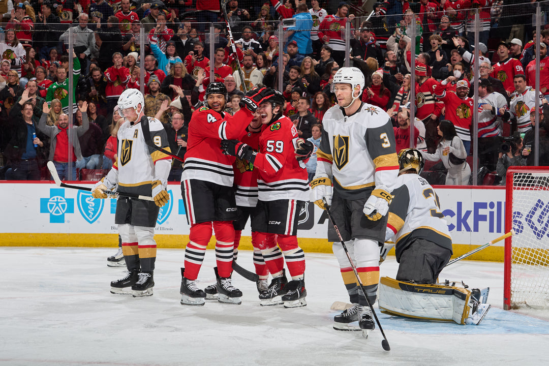 Chicago Blackhawks players Jones, Donato and Bertuzzi celebrating Bertuzzi goal against Vegas Golden Knights on January 18, 2025