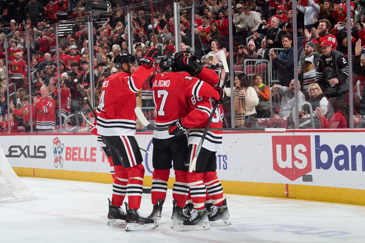 Chicago Blackhawks players Jones, Foligno and Bertuzzi celebrating Bertuzzi goal against Montreal Canadiens on January 3, 2025