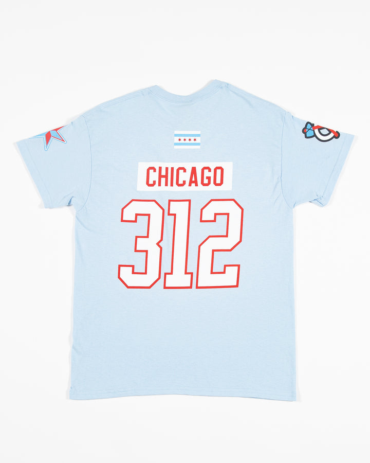 light blue Chicago Blackhawks tee with Chicago 312 in jersey format and Chicago flag on top, tonal secondary logo on right shoulder and star graphic on left shoulder - back lay flat