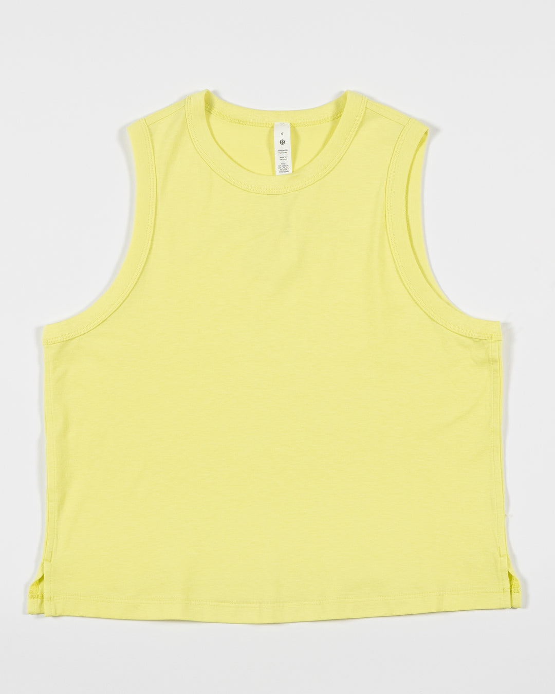 yellow lululemon tank top with Chicago Blackhawks logo on back - front lay flat